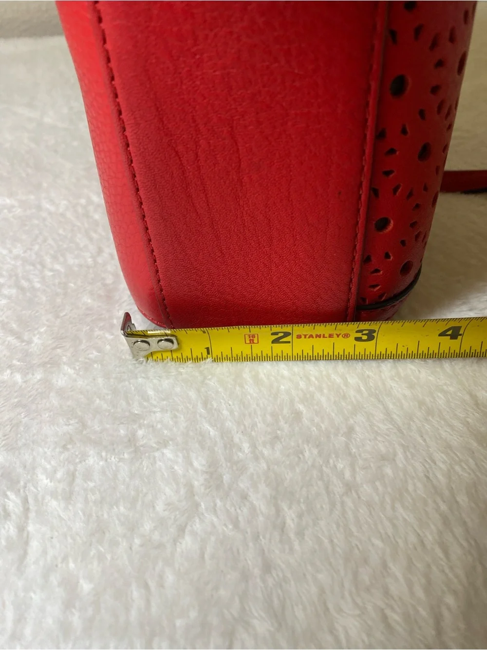 kate spade Perri Lane Bubbles Looloo red laser-cut crossbody